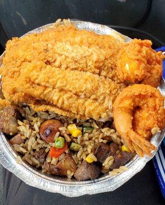 Fried Rice with pork, chicken & sausage. Really delicious rice.  Fantastic fried fish and shrimps on top. Great lunch.