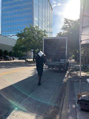 Our professionals loading the truck to bring back electronics for processing.