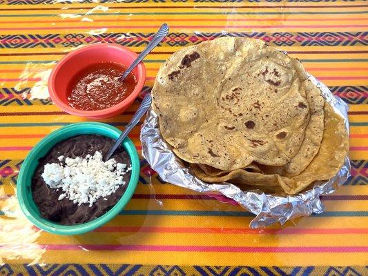 Black Beans, Choice of Salsa and Warm, Freshly Made Tortillas Included with Platillo