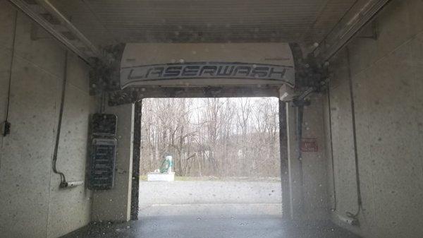 Pulling into the carwash bay. Nice day, we'd like to see out the windows.