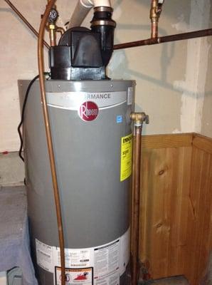 Installation of new hot water tank.