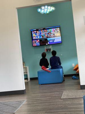 The gaming tv and console they can use before and after the appt when waiting.   There are 4 gaming controllers.