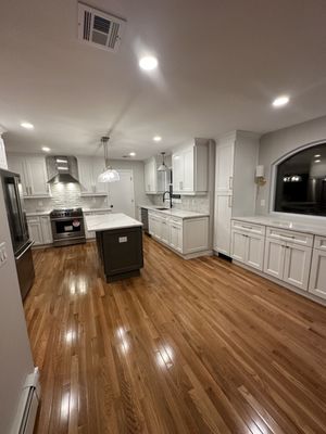 New updated kitchen, lights, cabinets, Counter tops, doors, and flooring