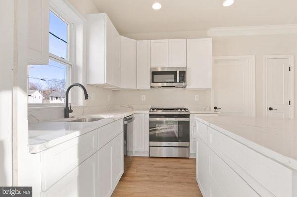 White Cabinets and White  Quartz Countertop, delivered!