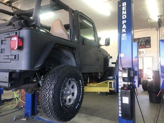 New tires- Jeep on the lift