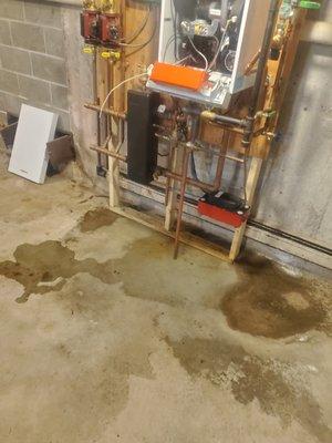 THIS IS MY Broken boiler bean town broke and is currently spilling water into are basement THANKS BEAN TOWN! ...service sucks