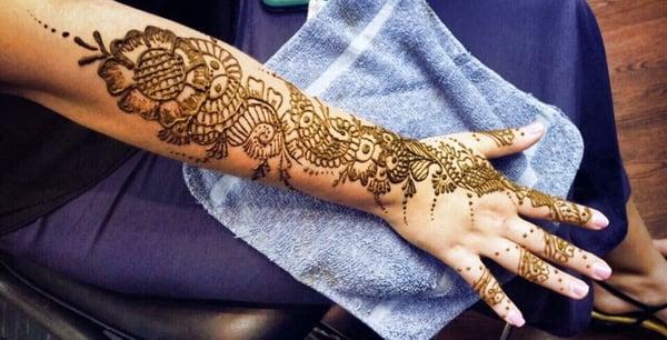 Beautiful herbal Henna tattoo by Sajida at Aisha's Hillcroft. These intricate designs are done freehand and can last up to 10 days.