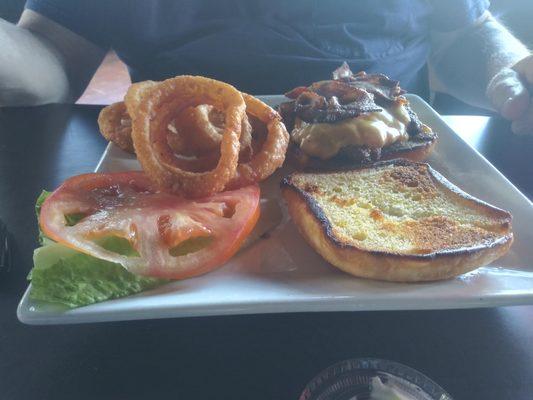 Very fat bacon cheeseburger with onion rings and all the fixin's