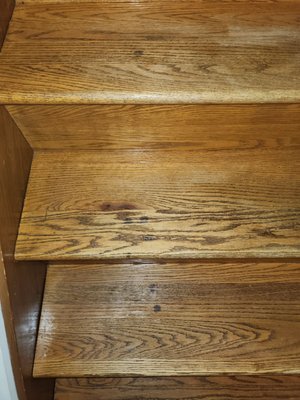 Hornungs wallpaper steamer dripped damaging black liquid onto our hardwood stairway.