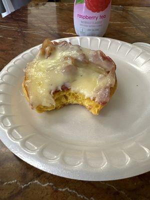 Half of a $10 bacon and cheese bagel.