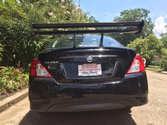 Aftermarket Spoiler installed amazingly here.