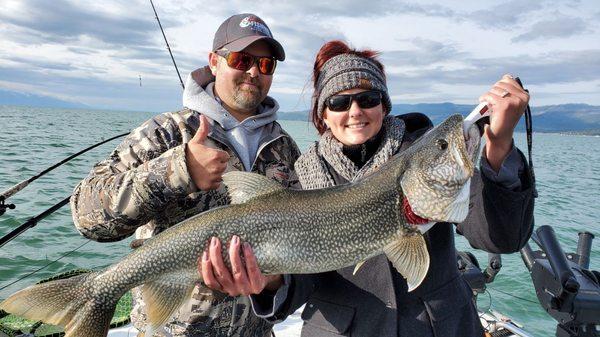 The guide, Cameron, and I holding a 35" lake trout before releasing.