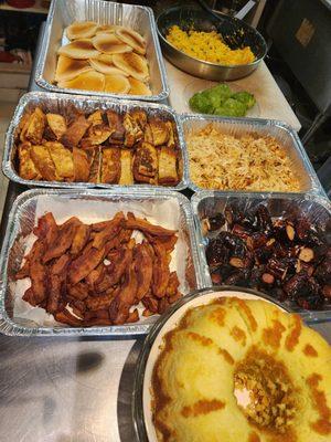 Catered breakfast, sour cream pancakes, vanilla cinamon french toast,, bacon, grilled turkey sausage, eggs w/ sauteed peppers onions,