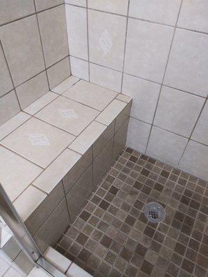 Tiled shower with bench