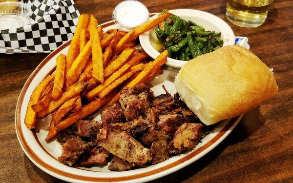 Burnt ends meal with sweet potato fries and green beans.