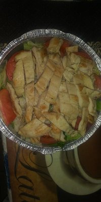 Grilled chicken salad with extra chicken $12 no dressing.