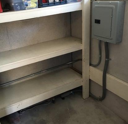 Nice EMT bending from subpanel to route around the shelf and keep it usable