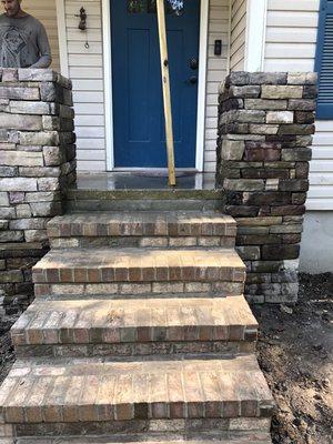 Brick steps and stone columns