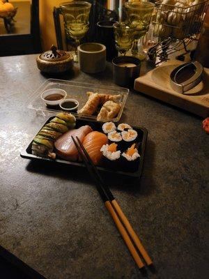 9/21/2022 - Glorious takeout delivery from Ubereats.... Dragonroll, Salmon Sashimi, Yellowtail Sashimi, Salmon Roll and some Gyoza.