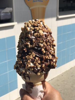 Vanilla ice cream cone dipped in chocolate and peanuts - SO GOOD!