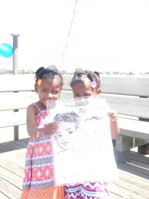 Maliyah and Malayah showing off the finished product