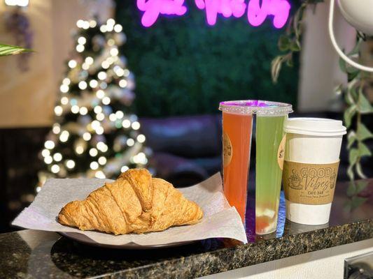 Buttered croissant, split drink and hot latte!