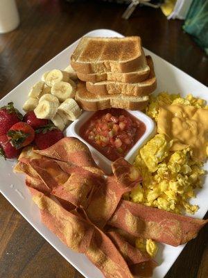 Cheese Eggs, Veggie Bacon, fresh Fruit, fresh salsa, toast & Lemonade