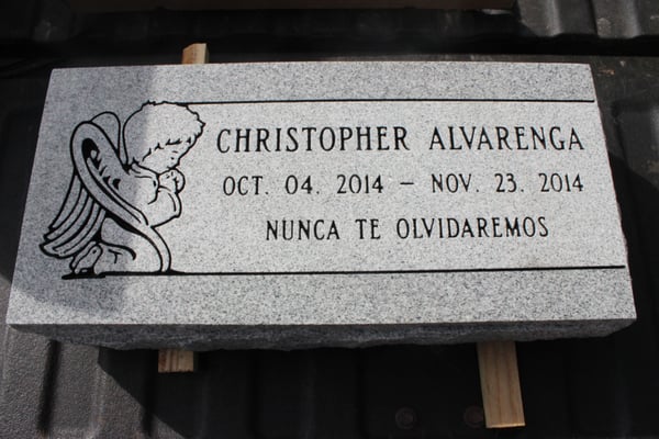 22" x 10" x 4" Flat Marker - Child Memorial with Praying Angel Design with Foreign Language Engraving.