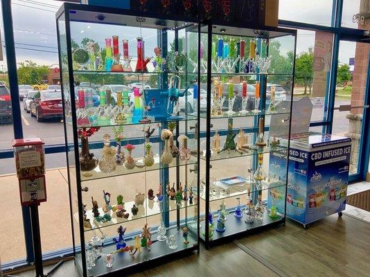 Beautiful showcases line our windows filled with glass for you to come check it out today!