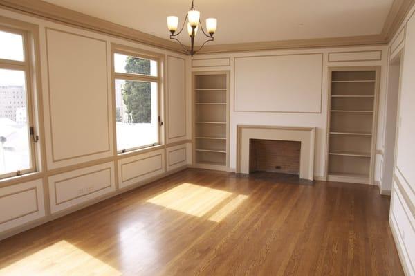 Fully operable windows, hardwood floors, and a faux fireplace in one of our two bedroom units.