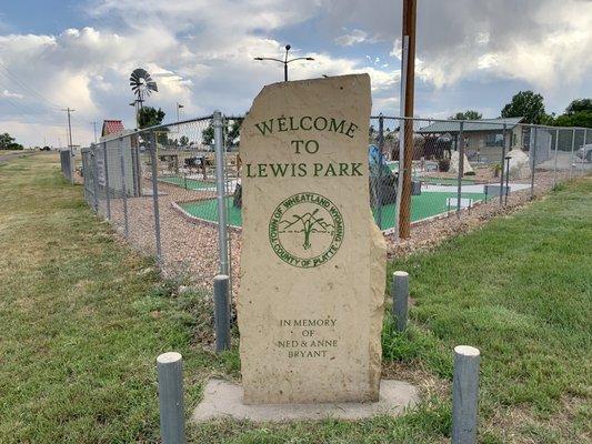 Entrance marker for Lewis Park with the mini golf section located right behind it.