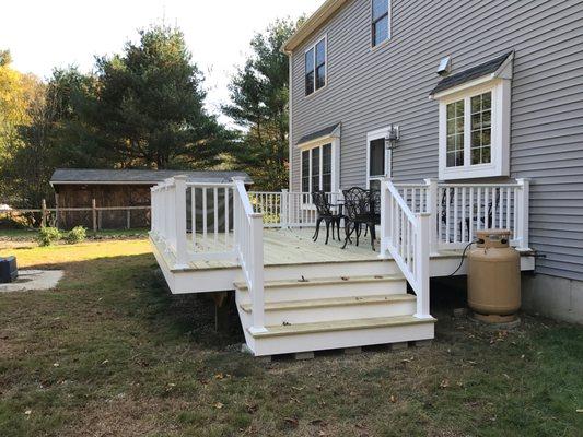 New deck and railings, wider stairs