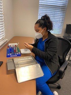 Our staff preparing shots for our allergy patients.