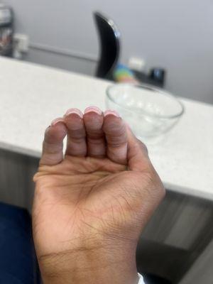 How my nails look AFTER me being left to file them myself.