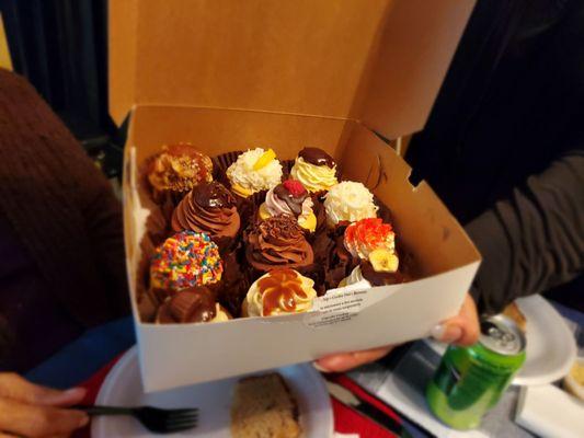 Wonderful array of cookies.banana pudding, lemon coconut, raspberry chocolate, triple chocolate, red velvet, chocolate eclaire.deliciousness