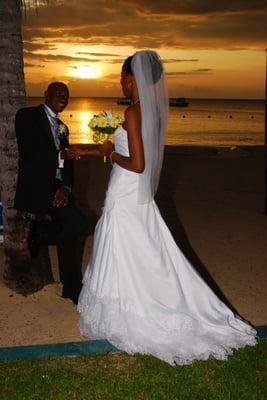 That's no artificial backdrop... that's a real sunset at a real Sandals/Beaches Weddingmoon in Negril, Jamaica!