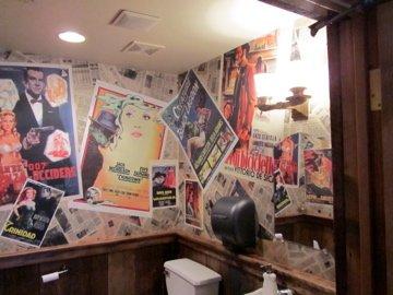 Custom Newsprint and movie posters installed as wall covering