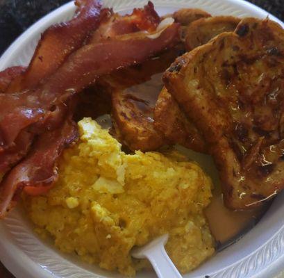 Little fatz plate: scrambled eggs,cinnamon raisin french toast,bacon