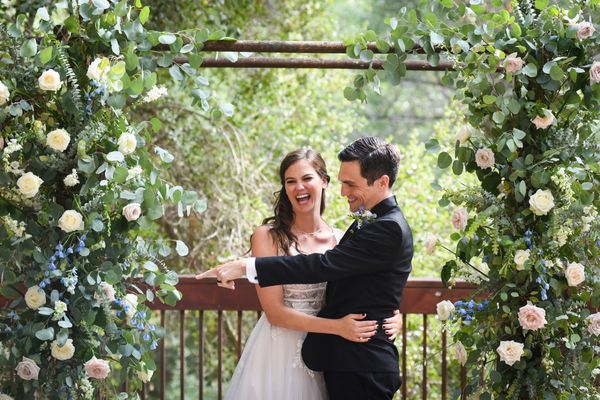 Ceremony . Radiating joy. Arch florals. natural back drop. Nature lover's paradise.