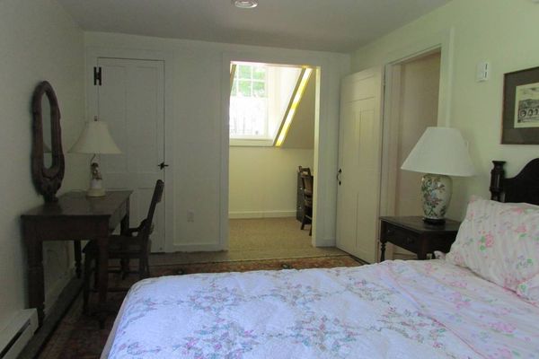 Carriage House:  Master Bedroom with sun room office through doorway