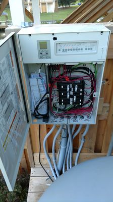 This is a custom swimming pool controller. It controls the lights and motors.