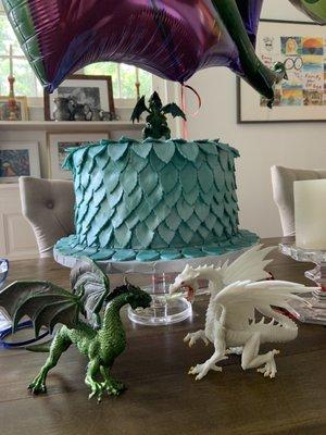 This is a dragon-themed cake with a vanilla sponge inside. They created it exactly as I asked. Would recommend this local bakery.