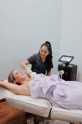 Sydney giving me laser hair removal on my underarms! Best results,too. I haven't had to shave in weeks