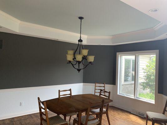 Dining Room. Sherwin William's Bright White, Gauntlet Grey and Watery on the ceiling. We love how it turned out.