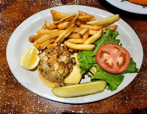 Jumbo Lump Crab Cake sandwich with hand-cut fries and pickle spear.