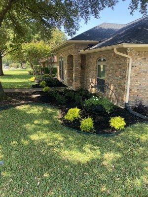 Here we install mulch and plants