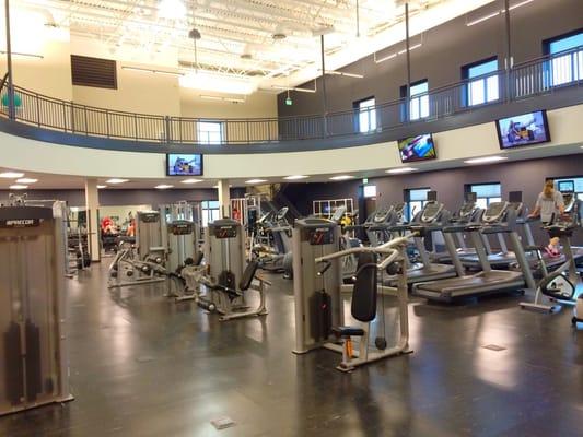 Two-story gym with weights and cardio on the lower level.