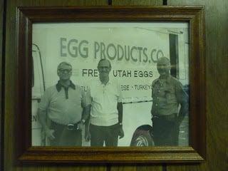 The two Glauser brothers on the left are past owners of Egg Products Company.