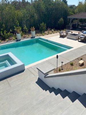 Pool, concrete, walls, deck, planters, fire pit