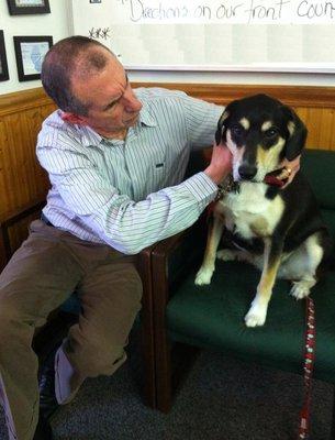 Dr. Neil Elliott with #1 patient, Clem the Dog